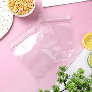 Detailed view of two clear self-sealing plastic bags for food and hardware storage