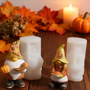 Macro shot of silicone gnome molds featuring pumpkin and pie for DIY harvest candles