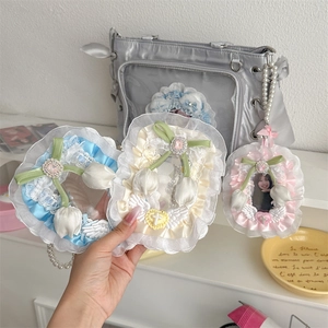 Handmade lace tulip photocard holder with ribbon bow and pearl details for idols
