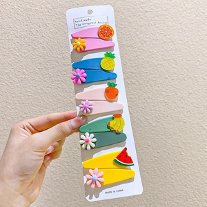 Close-up of 10-piece set colorful macaron fruit and flower BB hair clips for kids