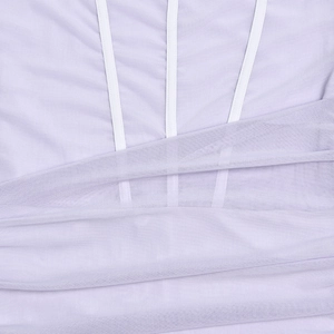 Detail of light purple corset dress with mesh ruching and white boning structure