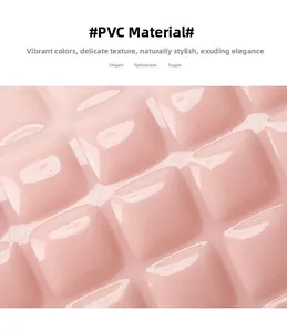 Close-up of pink glossy PVC material with a quilted diamond pattern for handbags