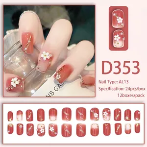 Coral pink gradient press-on nails with 3D white flowers and pearl accents, 24 pieces set