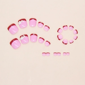 French style white daisy press-on toenails with red tips and floral accents