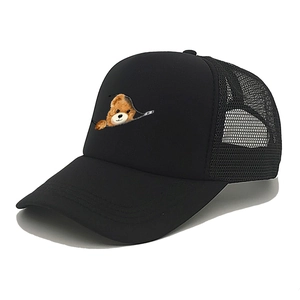 Detail of breathable black mesh trucker hat with creative cartoon bear print on front