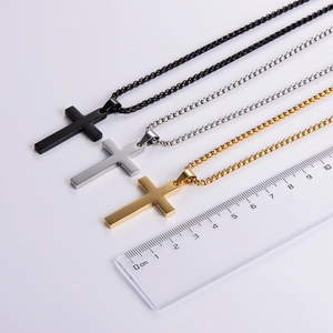 Three minimalist cross necklaces in black, silver and gold with measuring ruler