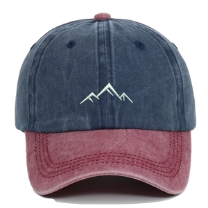 Detail of navy and burgundy washed cotton baseball cap with mountain embroidery