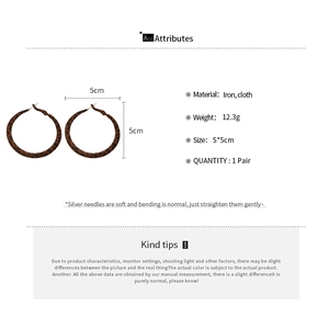 Detailed spec sheet showing 5cm brown leopard print hoop earrings and material info