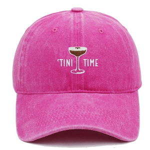 Close-up of Tini Time martini embroidery on vintage washed rose pink baseball cap
