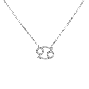 Detailed close-up of a silver Cancer zodiac necklace with sparkling zircon accents