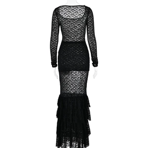 Detail of the sheer black lace back and ruffled fishtail hem on the slim-fit dress