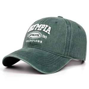 Close-up of dark green washed cotton baseball cap with white athletic embroidery