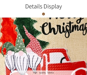 Macro detail of high quality linen fabric with Christmas truck and gnome printing