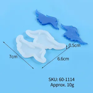 DIY wing-shaped silicone mold for resin casting with blue wings and 7x6.6cm measurements