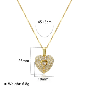 Elegant gold heart pendant necklace with wings and crystals on a minimalist chain