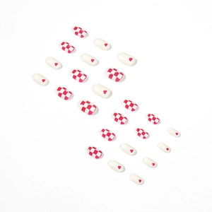 Creamy white and berry red checkerboard press-on nails with heart design in 24-piece set