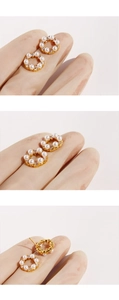 Detailed views of gold mini pearl wreath stud earrings with small zircon accents