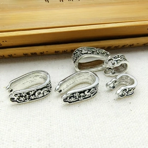 Ethnic style Tibetan silver engraved clasp charms and rings on traditional bamboo scroll