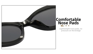 Close-up of comfortable integrated nose pads on black oval sunglasses for women