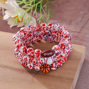 Red white blue splattered beads bracelet with football baseball and basketball charms