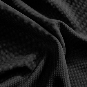 Macro shot of breathable black honeycomb textured knit fabric for a sports polo shirt