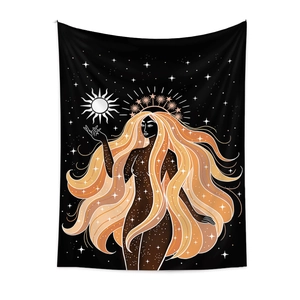 Detail of Bohemian tapestry showing a mystical goddess holding a sun with celestial stars