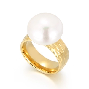 Baroque stainless steel ring with gold finish, large white pearl, and hammered texture