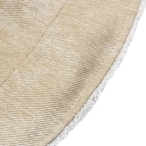 Close-up of khaki twill fabric with white faux shearling lining and precision stitching