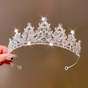 Elegant silver tiara with sparkling crystal rhinestones and pear-shaped zircon accents