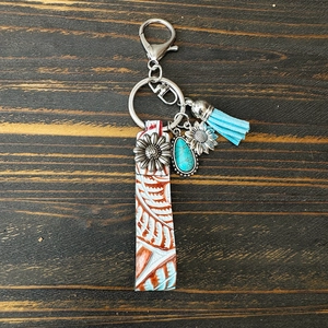 Porte-clés bohème en cuir avec breloque tournesol, pendentif turquoise et gland bleu