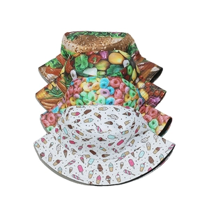 Detail view of four cotton bucket hats featuring hamburger, fruit, and dessert prints