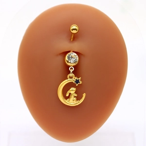 Piercing ombelico dorato con pendente coniglio luna, zircone e stella blu