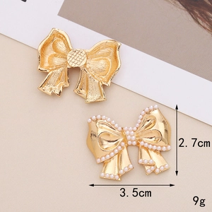 Golden metal bow shoe charms with pearls, size 2.7x3.5cm, ideal for DIY clog decoration