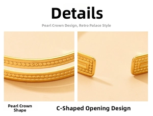 Detalle del diseño de corona de cuentas vintage en un brazalete de acero dorado abierto