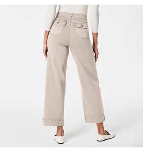 Rear view of high waist wide leg cropped trousers in beige cotton twill with back pockets