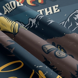 Détail du tissu de tapisserie camping avec motifs montagne vintage et texture tissée