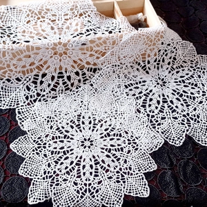 White round hollow lace coaster with floral embroidery for elegant table decoration