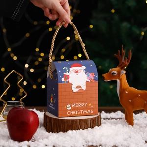 Cartoon Santa Claus Christmas gift box with rope handle in festive holiday setting