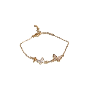 Gold plated butterfly bracelet with sparkling zircon and mother of pearl inlays