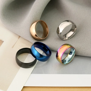 Five pieces of 8mm polished stainless steel rings for men in various metallic colors