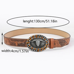 Detail of 130cm western leather belt with bull head buckle and floral embossing
