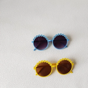 Kids round daisy sunglasses in blue and yellow colors with UV protection floral frames