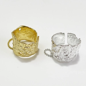 Irregular wide gold and silver open rings with hammer texture and bead chain charms