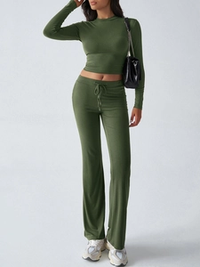 Detail view of army green long sleeve crop top and drawstring yoga pants set