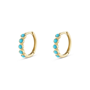 Detail of S925 sterling silver huggie earrings with five turquoise gemstones in gold finish
