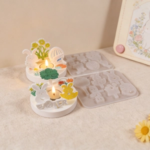 Detail of Easter bunny resin silicone mold with finished floral candle holder and base