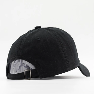 Detail view of the black cotton baseball cap showing the adjustable metal buckle closure