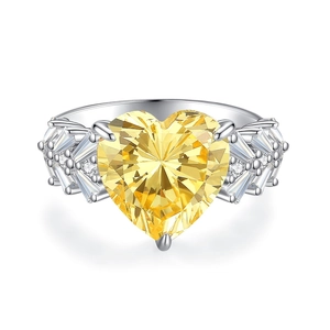 Exquisite S925 sterling silver ring featuring a large heart-shaped yellow gemstone and side diamonds
