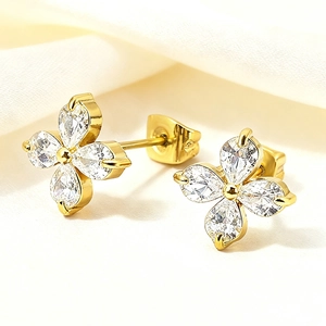 Exquisite 18k gold titanium steel four-leaf clover stud earrings with zircon on white silk