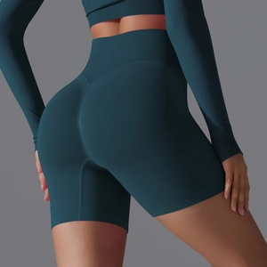 Detail of forest green seamless high waist yoga shorts with scrunch butt lifting effect